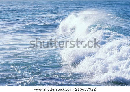 Crashing waves on a sunny day in the Sunshine Coast, Queensland - Australia.