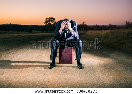 Concept: A frustrated business man is leaving the corporate lifestyle and chasing freedom in the outback of Queensland, Australia. Cinematic Portrait Style.