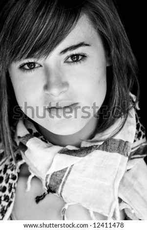 Serious young woman, black and white portrait