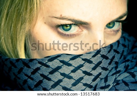 Green eyed beauty with covered face