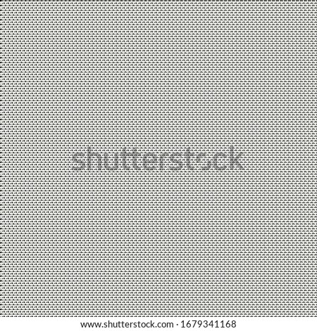 Texture pattern with black dots on beige background. Tarp or strong fabric.