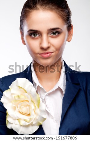 portrait close-up with an easy smile and a flower accessory