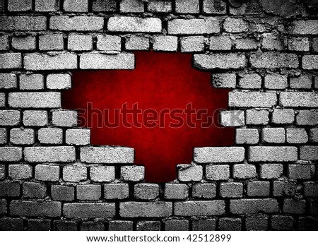 large hole on brick wall