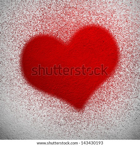 red spray painting with love shape