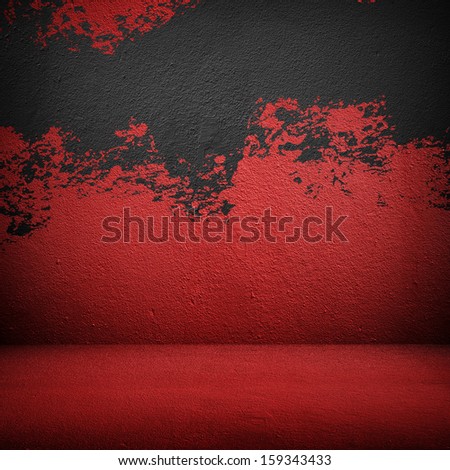 red wall with splash of paint