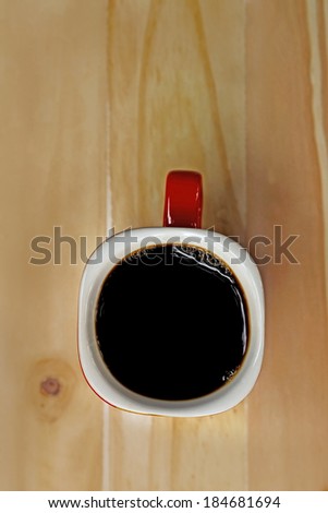 bird eye view of coffee cup on wooden background