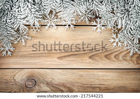 Christmas background with spruce tree covered with snow. Copy space. Top view