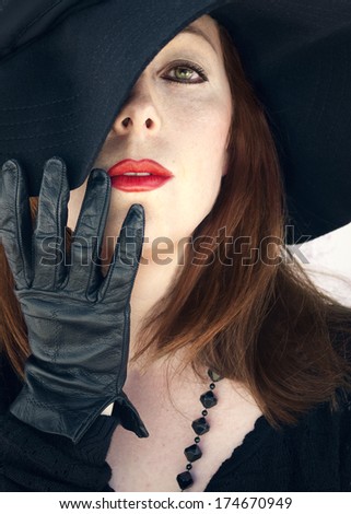 Lady with leather gloves.