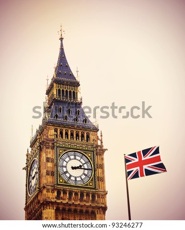 Big Ben and Union Flag, Houses of Parliament, Westminster Palace, London Gothic architecture.