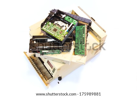Electrical and electronic waste. Old computer parts on white background.