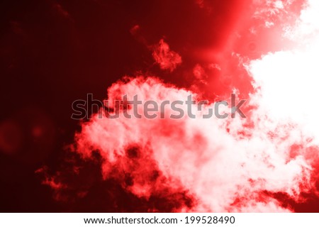 Infra Red Radiation. Clouds in the Sky over Sun, Red Toning. Abstract Background.