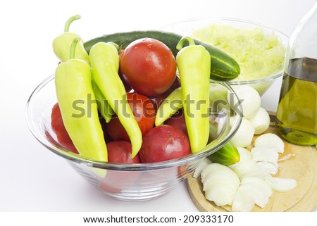 Chopped Onion and Fresh Vegetables in a Glass Bowl. Close up. Organic Food.