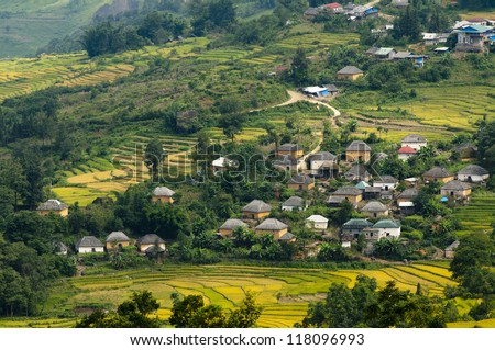A village with traditional architecture houses (Trinh Tuong house style) of Hani ethnic minority people in Laocai, Vietnam