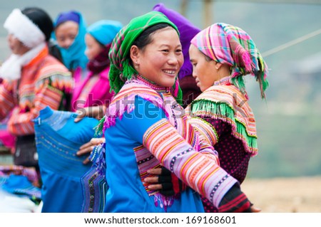 LAOCAI, VIETNAM, DECEMBER 28: H'mong ethnic minority woman in Cancau traditional market on December 28, 2013 in Laocai, Vietnam. H'mong is the 8th largest ethnic group in Vietnam.