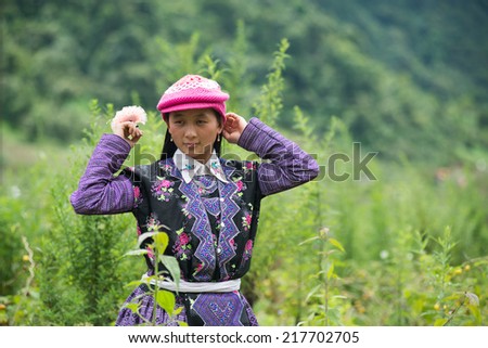 MOCCHAU, VIETNAM, SEPT 2: H\'mong ethnic minority woman with traditional dress in a festival on September 2, 2014 in Mocchau, Vietnam. This is biggest festival of H\'mong ethnic minority people.