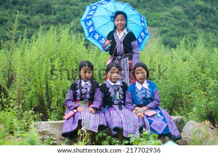 MOCCHAU, VIETNAM, SEPT 2: H\'mong ethnic minority girls with traditional costume in a festival on September 2, 2014 in Mocchau, Vietnam. This is biggest festival of H\'mong ethnic minority people.