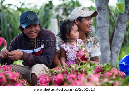 BINHTHUAN, VIETNAM - JUNE 22: Farmers sell dragon fruit near the road - June 22, 2015 in Binhthuan, Vietnam.