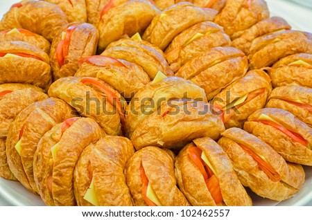 A plate of veggie croissants for catering events.