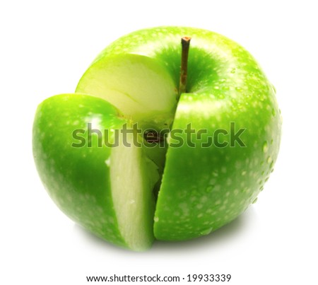 The ripe juicy green apple covered by water drops. Isolation on white.