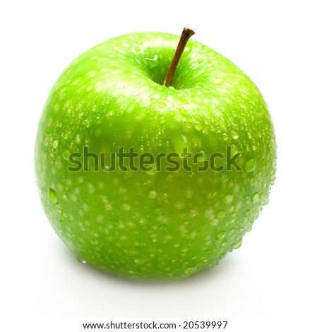 The ripe juicy apple covered by drops of water. Isolation on white, shallow DOF.