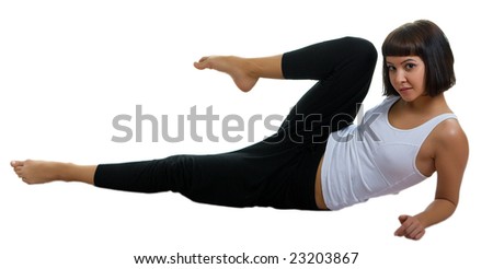 The girl in sportswear is engaged in fitness on a white background. Isolation