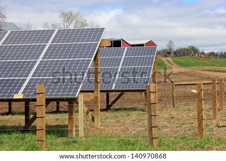 Solar panels facing the sun and gathering alternative energy, with the future\'s environment in mind.