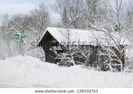 A snow blanketed Emily\'s covered bridge in Stowe Vermont, USA