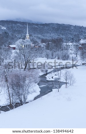 Community church at dusk during the winter, Stowe, Vermont, USA