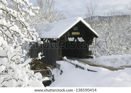 A snow blanketed Emily\'s covered bridge in Stowe Vermont, USA