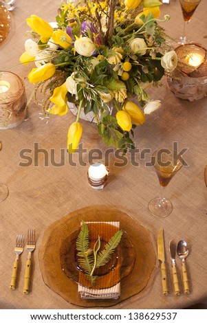 Table setting at a high end wedding.