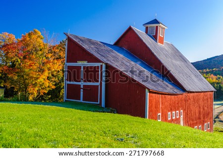 Red barn during a New England fall foliage, Stowe, Vermont, USA