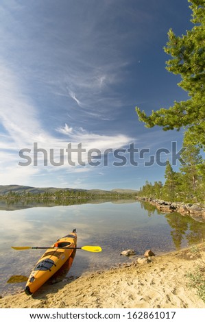 Kayak at lake rogen, nature reserve, haerjedalen, sweden
