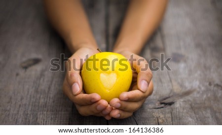 Yellow Apple with engraved heart