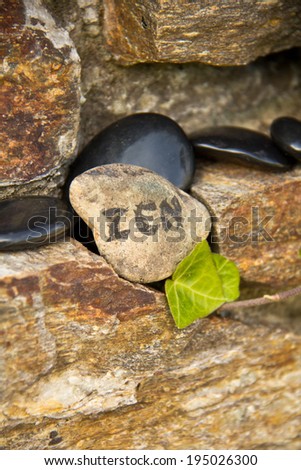Massage stones and Zen-Stone on a wall