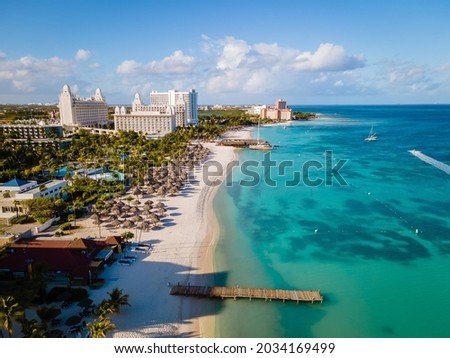 Palm beach Aruba Caribbean, white long sandy beach with palm trees at Aruba Foto d'archivio © 