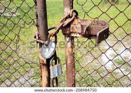 locked gate on a private plot