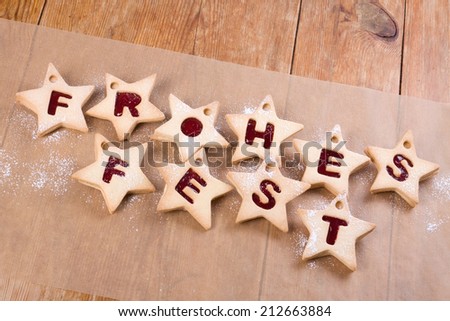 Happy Christmas bakery, cookies with the German words: \