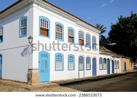 Corner two story and one story colonial houses n the late afternoon sun in historic town Paraty, Bra Stok fotoğraf © 