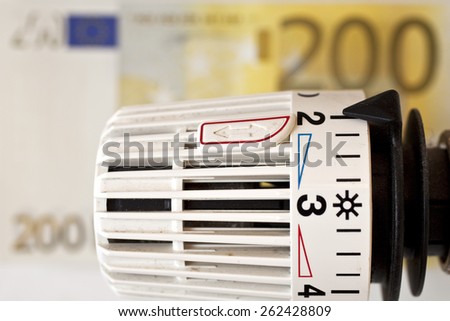 heating thermostat and Euro bills, heating coasts