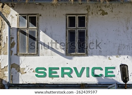 former car service station labeled Service