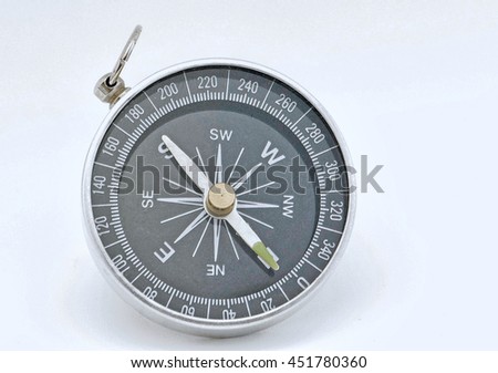 a single round compass on a white surface Foto stock © 