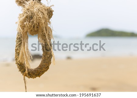 ring-shaped rope and the sea in background