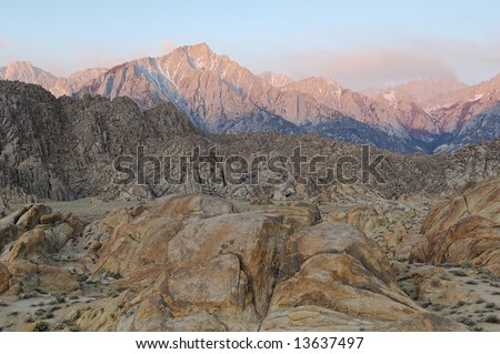Alpenglow on the Eastern Sierra Nevada Mountains and Alabama Hills, California, USA