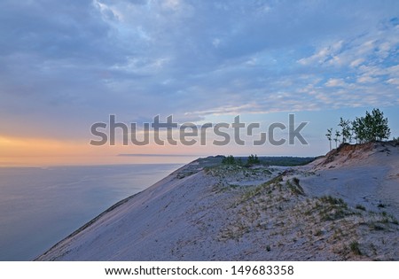 Landscape at twilight of sand dune and waters of Lake Michigan, Sleeping Bear Dunes National Lakeshore, Michigan, USA