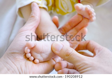 Newborn baby foot sole massage
