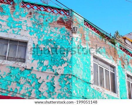 GUANAJUATO, MEXICO - OCTOBER 26, 2013: World Heritage Site (1988). Old building, painted with vibrant color in the Historic mine city of Guanajuato. The city has about 170,000 population.