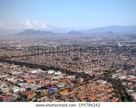 MEXICO CITY, MEXICO - NOVEMBER 16, 2013: View from the sky, the Greater Mexico City has a population of approximately 20 million people.