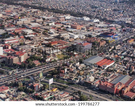 MEXICO CITY, MEXICO - NOVEMBER 16, 2013: View from the sky, the Greater Mexico City has a population of approximately 20 million people.