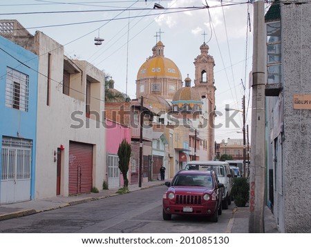 AGUASCALIENTES, MEXICO - OCTOBER 7,  2013:  Cityscape with old cathedral in downtown  Aguascalientes city, Aguascalientes State, North central Mexico.
