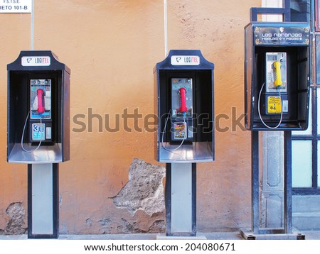 AGUASCALIENTES, MEXICO - SEPTEMBER 13, 2013: Pay phones or public phones in the city center of downtown Aguascalientes city, Aguascalientes State, North central Mexico.